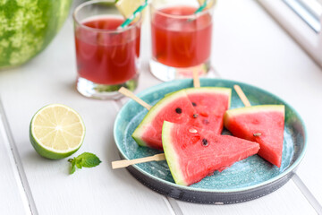 Fresh delicious watermelon sliced with mint and watermelon juice