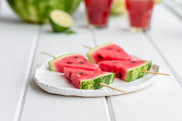 Fresh delicious watermelon sliced with mint and watermelon juice