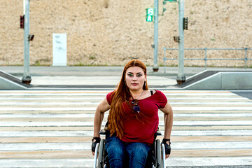 Disabled girl on a pedestrian crossing