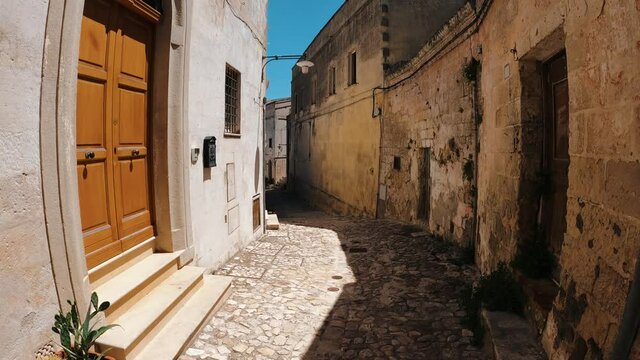 View of a narrow alley in the city of Matera, Italy