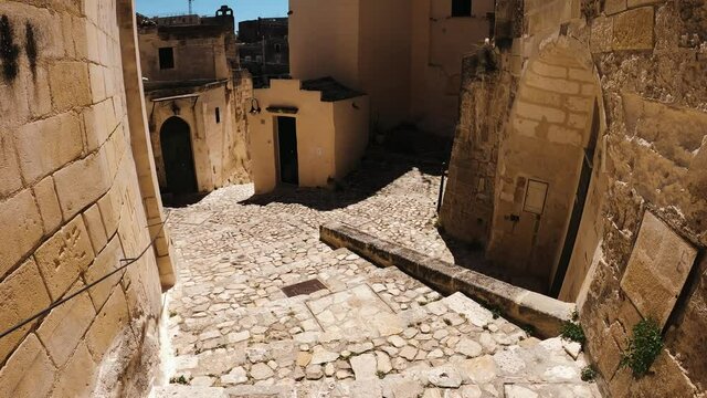 View of a narrow alley in the city of Matera, Italy