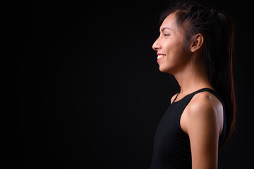 Portrait of happy young beautiful Asian transgender woman