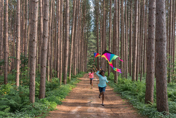 Black Girls Running With Rainbow Kites