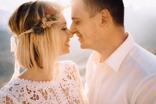 Couple in love happy portrait at sunset back light