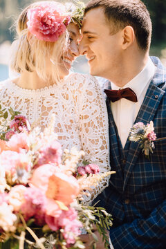 Closeup portrait of happy stylish couple in love on their wedding day