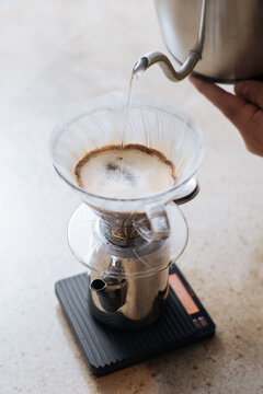 Person making coffee by pourover