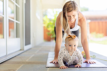 mother's fitness with baby at home