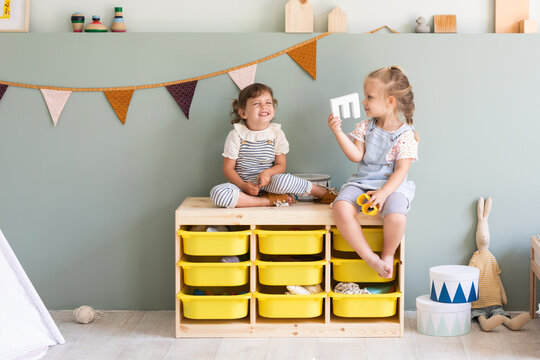 Little Girls Playing Guess Who