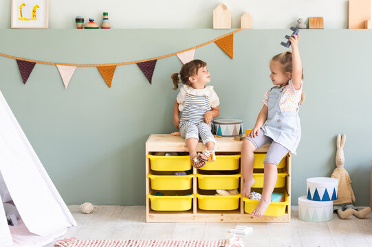 Little Girls Playing Guess Who