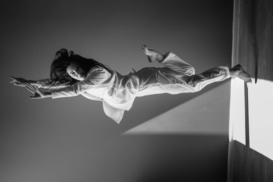 Pretty girl making new acrobatic tricks.