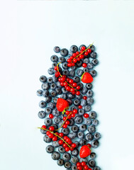 Conceptual food. Creative food background of fresh berries for design. Close-up