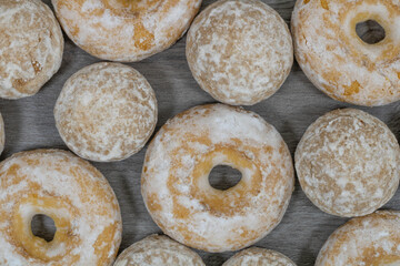 Sweet gingerbread cookies with donuts in sugar glaze.