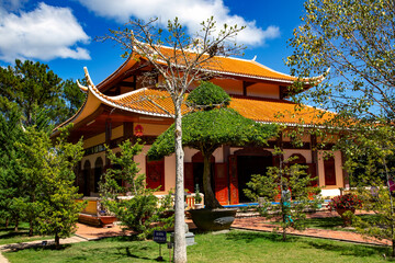 Beautiful Vietnamese buddhist temple Chinese classical architect. Monastery lays in the middle of the pine forest in Da Lat, Vietnam