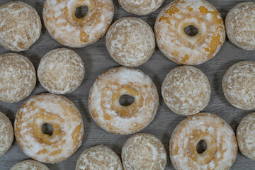 Sweet gingerbread cookies with donuts in sugar glaze.