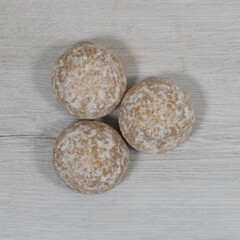 Sweet gingerbread cookies in sugar glaze. Gingerbread background.