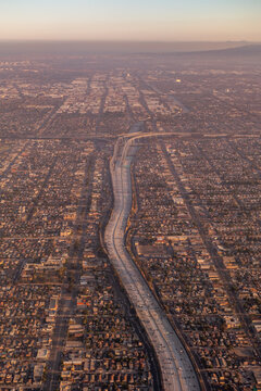 A glowy view of two highways intercepting at sunset in LA