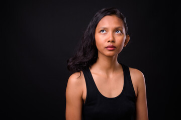 Portrait of young beautiful Asian woman with nose ring