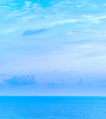 Fototapeta na wymiar Calm Sea Ocean And Blue Sky Background. Beautiful seascape at day time.