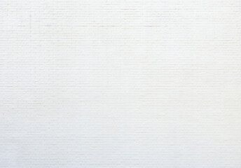 White new plastered brick wall viewed from the front. High resolution full frame textured background. Copy space.