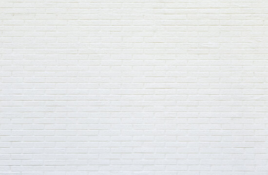 White new plastered brick wall viewed from the front. High resolution full frame textured background. Copy space. © tuomaslehtinen