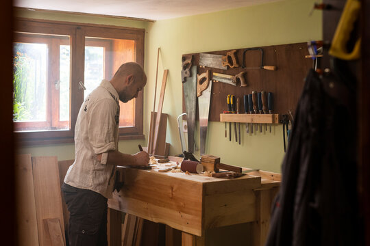 Carpenter working in his workshop