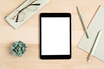 Styled minimal desktop mockup with organic color stationary, coffee cup, notepad. Freelancer, social media blogger concept. Flat lay, top view, copy space.