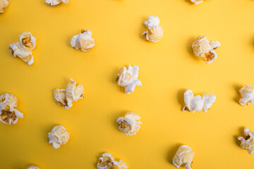 Popcorn on yellow color background minimal food