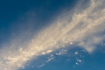 white fluffy clouds in the blue sky