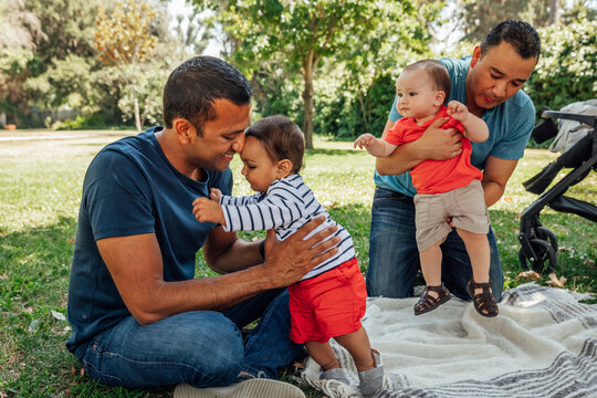 Dads Hold Their Kids