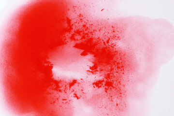 abstract bright red water colour paint in water