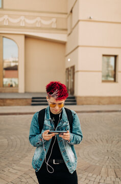 Real Lesbian Woman with red hairs using her phone