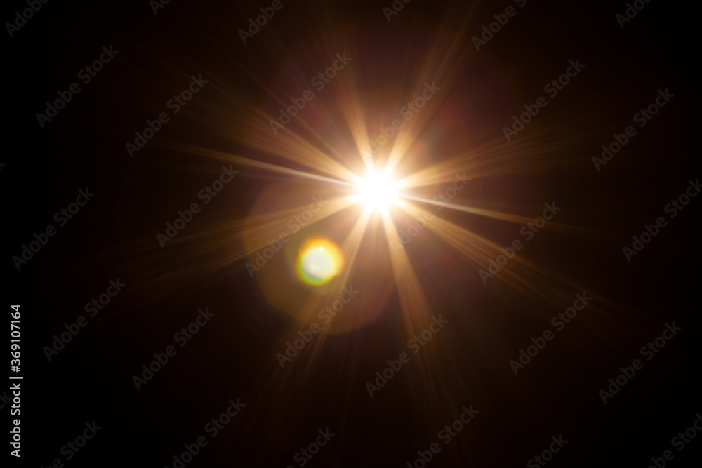 Poster Easy to add lens flare effects for overlay designs or screen blending mode to make high-quality images. Abstract sun burst, digital flare, iridescent glare over black background.