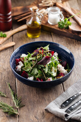 Healthy vitamin salad with beetroot cheese greens
