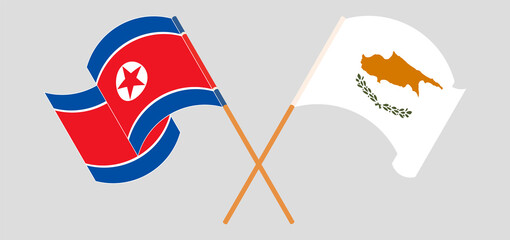 Crossed and waving flags of Cyprus and North Korea