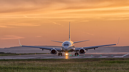 airplane landing at sunset Varna Airport