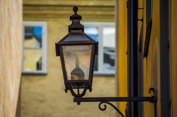 Retro lantern on one of the streets of the Old Town in Stockholm.