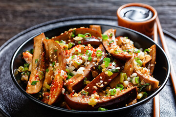 Gaji Namul, spicy eggplant in a black bowl