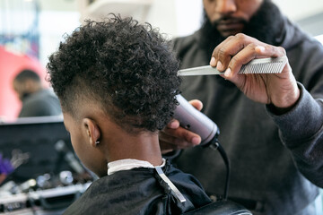 Barber: Anonymous Young Man Getting A Haircut