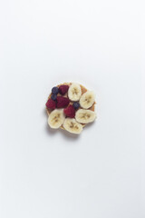 Healthy sandwich with berries and banana