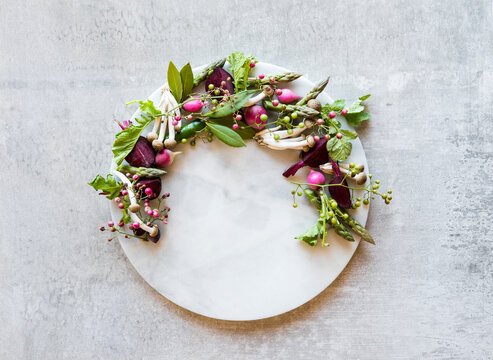Arrangement of seasonal foods on a marble platter
