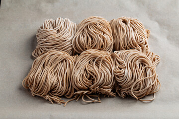 Nests of homemade raw  buckwheat noodles 