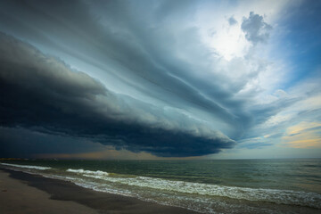 Imposing and dramatic storm clouds above a beach on Florida's Gulf Coast