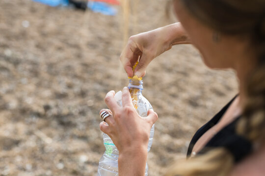 Volunteers cleaning up the beach from plastic and waste