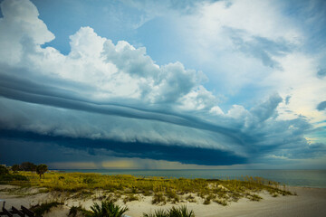 Imposing and dramatic storm clouds above a beach on Florida's Gulf Coast