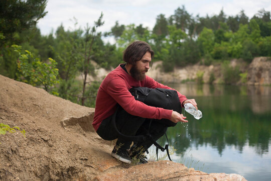 guy traveler at lake