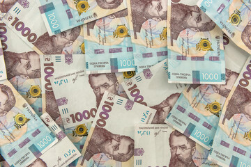 Top view background with  new banknote of Ukraine 1000, UAH.