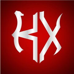 KX initials silver shield with maroon background