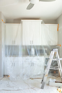 Painter's ladder in modern kitchen.