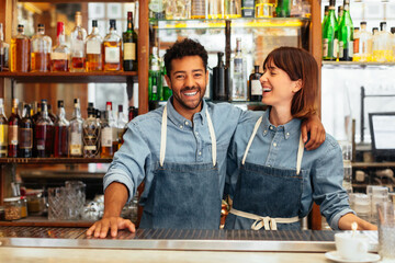 Two bartenders working in a beautiful restaurant