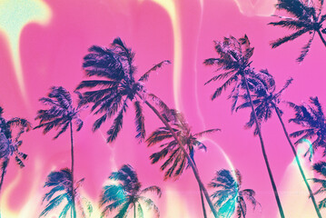 Bright pink and yellow palm trees on film